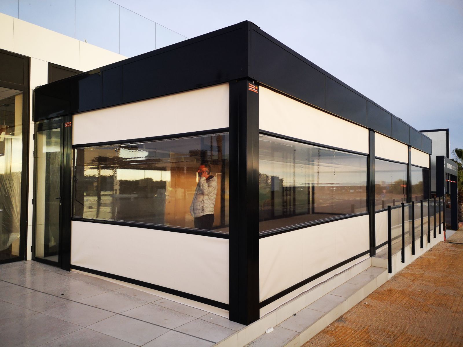 Enclosures with awnings